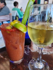 bloody mary and glass of chardonnay