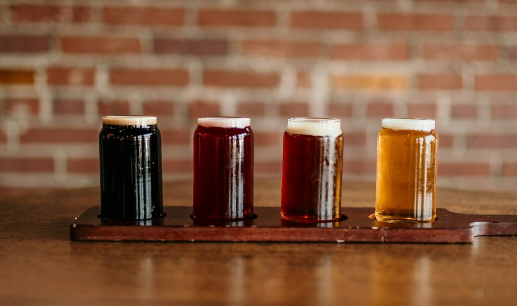 a group of beer glasses on a table