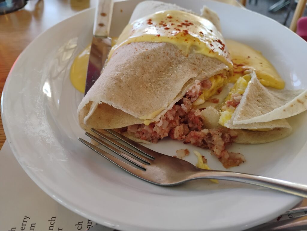 corned beef wrap plated with fork