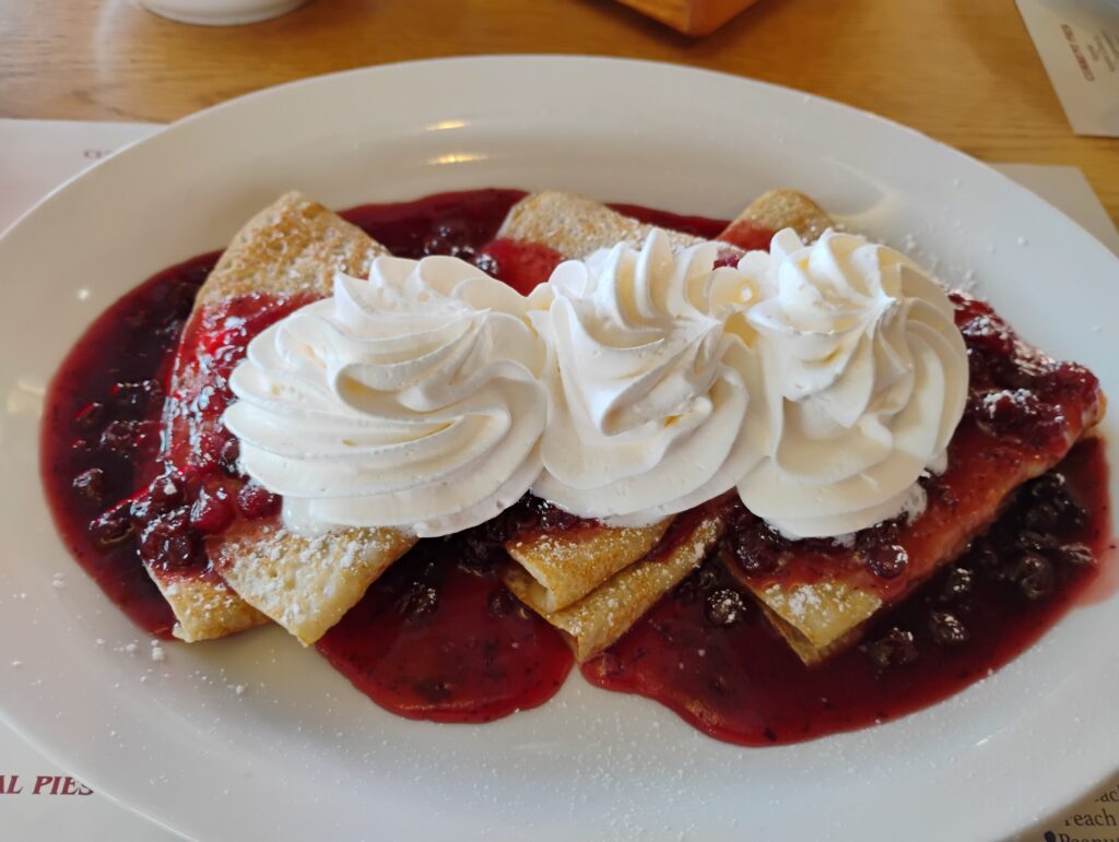 pancakes with berries and whipped cream